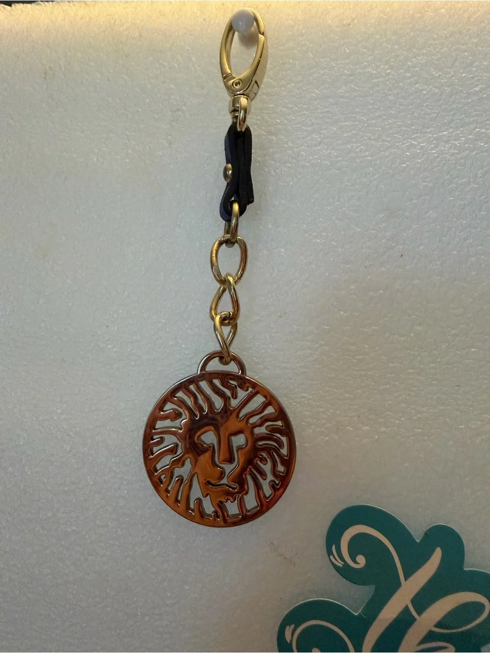 Anne Klein Gold Lion Medallion Keychain with Navy Accent